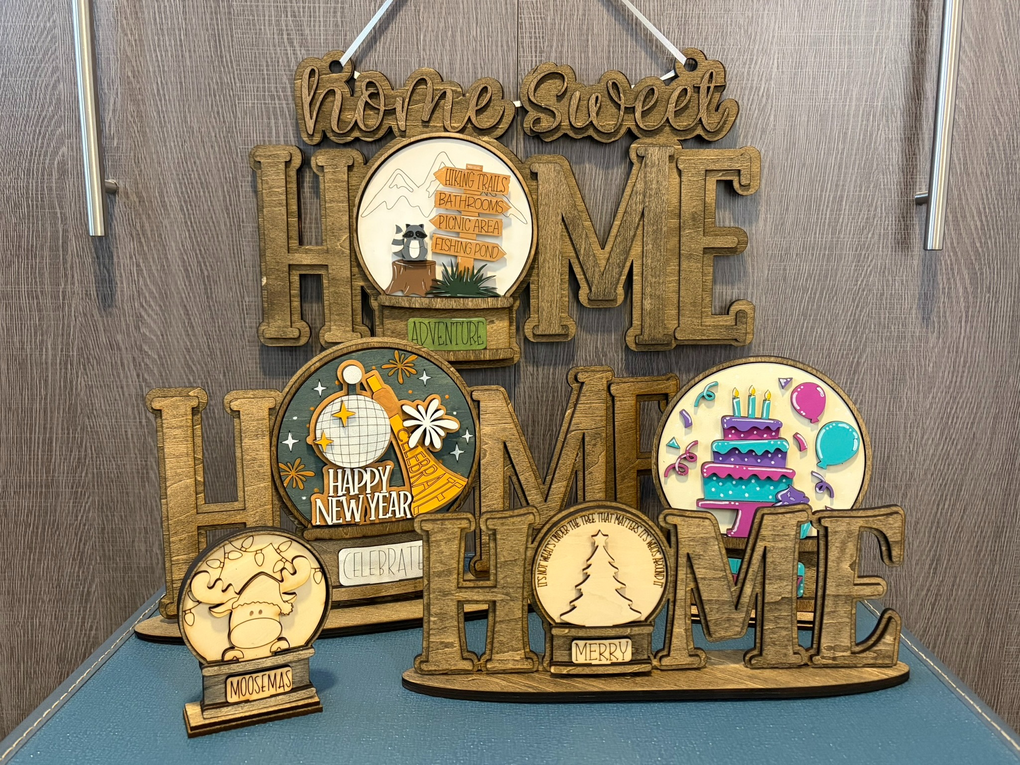Timber & Tumbler interchangeable Home signs and globe displays